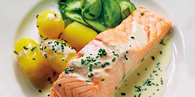 Poached salmon on serving plate